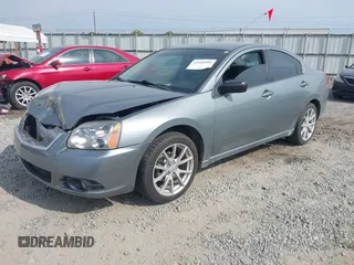 2008 Mitsubishi Galant ES z VIN 4A3AB36F78E018261, wystawiony jako IAAI lot #42103584 z przebiegiem 184 491 mil mil oraz . Historia ofert i sprzedaży dostępna na DreamBid. Obrazek 2.