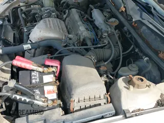 2000 Toyota Camry CE z VIN 4T1BG22KXYU974065, wystawiony jako IAAI lot #43284150 z przebiegiem 107 083 mil mil oraz . Historia ofert i sprzedaży dostępna na DreamBid. Obrazek 20.