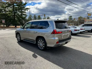 2016 Lexus LX 570 with VIN JTJHY7AX7G4203810, listed as a Copart auction lot 80800914 with 296,703 mi miles and Clean Title. Bid and sale history available at DreamBid. Image 3.