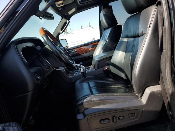 2015 Lincoln Navigator z VIN 5LMJJ2JT7FEJ04172, wystawiony jako Copart lot #51412255 z przebiegiem 220 416 mil mil oraz Szkoda całkowita • Salvage title. Historia ofert i sprzedaży dostępna na DreamBid. Obrazek 7.