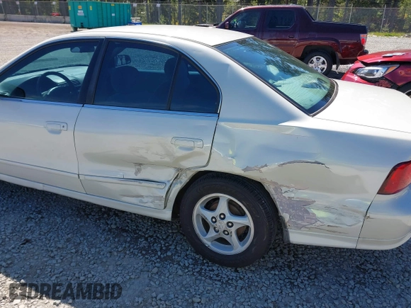 2003 Mitsubishi Galant ES z VIN 4A3AA46G63E162393, wystawiony jako IAAI lot #42184544 z przebiegiem 137 780 mil mil oraz . Historia ofert i sprzedaży dostępna na DreamBid. Obrazek 6.