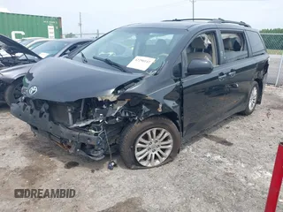 2011 Toyota Sienna XLE AAS with VIN 5TDYK3DC3BS103531, listed as a IAAI auction lot 42290142 with 231,995 mi miles and . Bid and sale history available at DreamBid. Image 2.