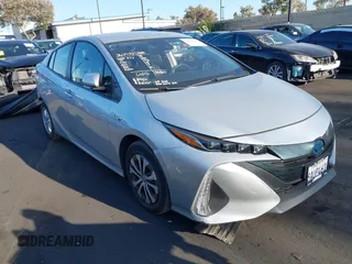 2022 Toyota Prius LE z VIN JTDKAMFP8N3211485, wystawiony jako IAAI lot #42515220 z przebiegiem 23 875 mil mil oraz . Historia ofert i sprzedaży dostępna na DreamBid. Obrazek 1.
