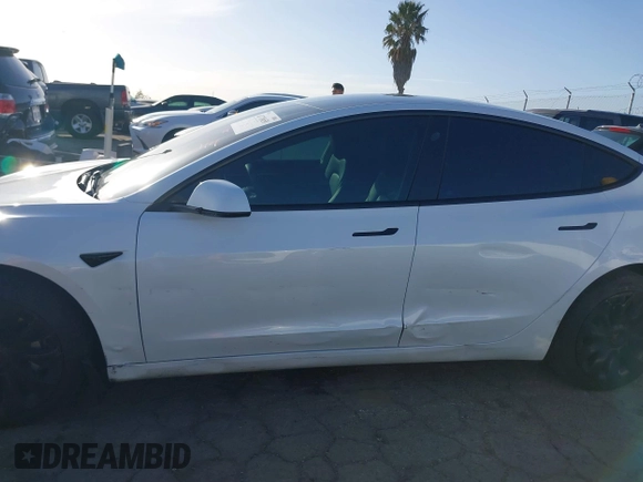 2023 Tesla Model 3 with VIN 5YJ3E1EA0PF503352, listed as a IAAI auction lot 41718658 with 28,426 mi miles and . Bid and sale history available at DreamBid. Image 14.