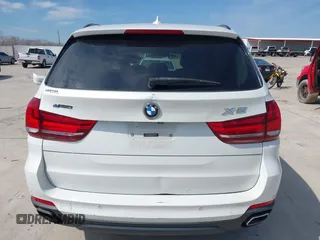 2016 BMW X5 xDrive40e with VIN 5UXKT0C51G0S76171, listed as a IAAI auction lot 41586244 with 85,517 mi miles and . Bid and sale history available at DreamBid. Image 17.
