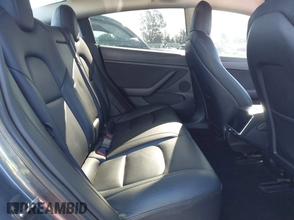 2022 Tesla Model 3 with VIN 5YJ3E1EA3NF165054, listed as a IAAI auction lot 41805729 with 225,773 mi miles. Bid and sale history available at carsss.com. Image 8.