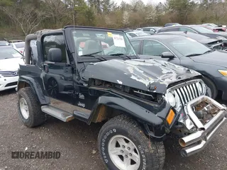 2004 Jeep Wrangler Sahara with VIN 1J4FA59S84P701479, listed as a IAAI auction lot 41721789 with 190,914 mi miles. Bid and sale history available at carsss.com. Image 1.