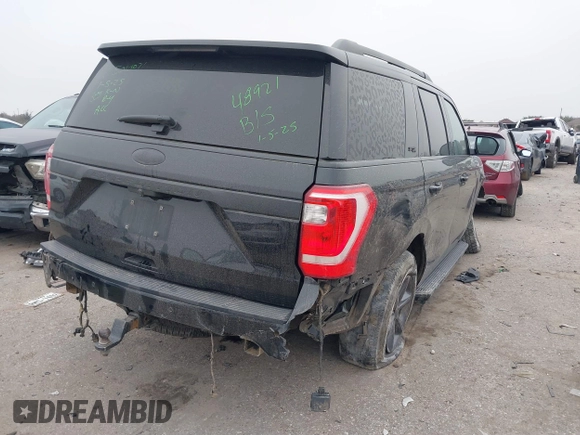 2021 Ford Expedition XL with VIN 1FMJU1FT5MEA84000, listed as a IAAI auction lot 41273172 with 77,049 mi miles. Bid and sale history available at carsss.com. Image 4.