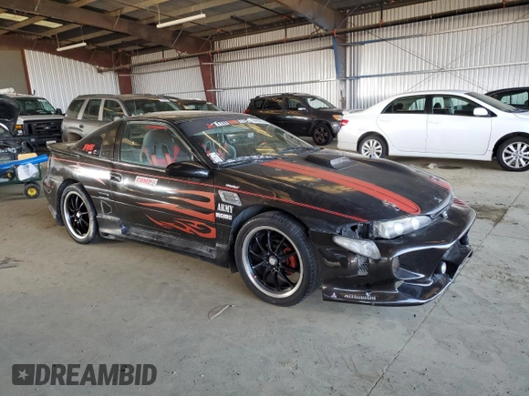 1992 Mitsubishi Eclipse with VIN 4A3CS44R9NE113833, listed as a Copart auction lot 84656744 with 217,186 mi miles and Clean Title. Bid and sale history available at DreamBid. Image 4.