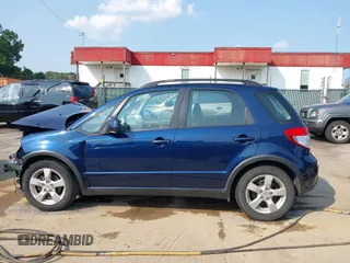 2011 Suzuki SX4 Crossover with VIN JS2YB5A38B6301589, listed as a IAAI auction lot 40112766 with 128,323 mi miles. Bid and sale history available at carsss.com. Image 15.