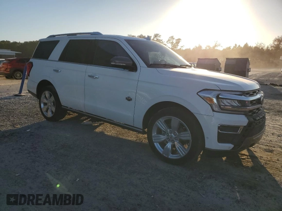2022 Ford Expedition King Ranch with VIN 1FMJU1PT3NEA15385, listed as a Copart auction lot 77123224 with 28,613 mi miles and Salvage Title. Bid and sale history available at carsss.com. Image 4.