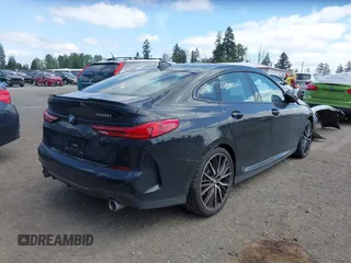 2020 BMW 2 Series 228i xDrive with VIN WBA73AK00L7F77132, listed as a IAAI auction lot 42129698 with 27,989 mi miles and . Bid and sale history available at DreamBid. Image 4.