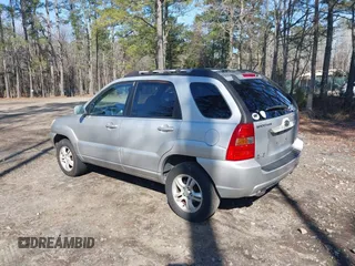 2005 Kia Sportage LX with VIN KNDJF723057130569, listed as a IAAI auction lot 41509247 with 155,777 mi miles and . Bid and sale history available at carsss.com. Image 3.