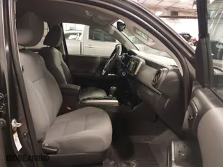 2019 Toyota Tacoma 4WD SR with VIN 3TMCZ5AN9KM275537, listed as a IAAI auction lot 41956988 with 102,933 mi miles. Bid and sale history available at carsss.com. Image 5.