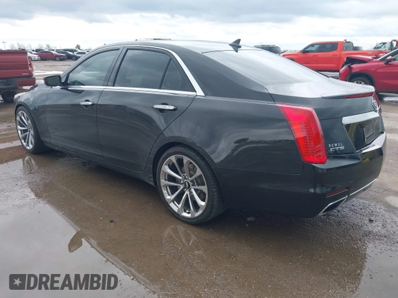 2014 Cadillac CTS Vsport Premium RWD z VIN 1G6AV5S89E0148907, wystawiony jako IAAI lot #41880678 z przebiegiem 148 052 mil mil oraz . Historia ofert i sprzedaży dostępna na DreamBid. Obrazek 3.