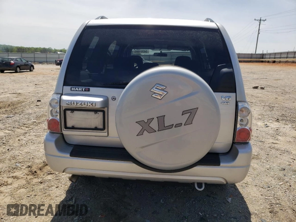 2006 Suzuki XL7 z VIN JS3TX92V564100121, wystawiony jako Copart lot #54261885 z przebiegiem 121 590 mil mil oraz Szkoda całkowita • Salvage title. Historia ofert i sprzedaży dostępna na DreamBid. Obrazek 6.