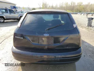 2007 Ford Focus S with VIN 1FAFP31N27W201266, listed as a Copart auction lot 51789625 with 211,274 mi miles and Salvage Title. Bid and sale history available at DreamBid. Image 6.