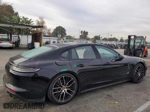 2022 Porsche Panamera z VIN WP0AJ2A79NL102055, wystawiony jako Copart lot #82739553 z przebiegiem 12 943 mil mil oraz . Historia ofert i sprzedaży dostępna na DreamBid. Obrazek 3.