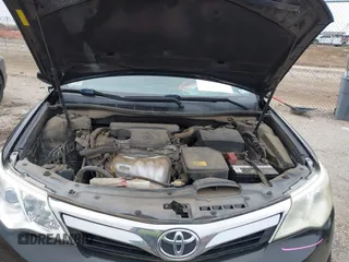 2014 Toyota Camry L with VIN 4T4BF1FK2ER390414, listed as a IAAI auction lot 41936368 with 164,811 mi miles and . Bid and sale history available at DreamBid. Image 10.