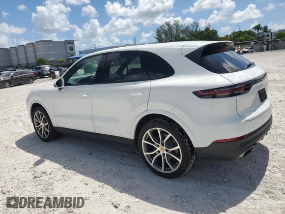 2021 Porsche Cayenne z VIN WP1AA2AY2MDA05988, wystawiony jako Copart lot #59500865 z przebiegiem 33 869 mil mil oraz Szkoda całkowita • Salvage title. Historia ofert i sprzedaży dostępna na DreamBid. Obrazek 2.