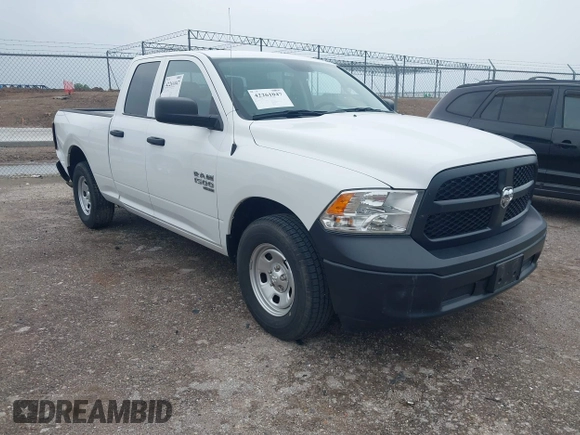 2023 Ram 1500 Tradesman z VIN 1C6RR6FG9PS527089, wystawiony jako IAAI lot #42261047 z przebiegiem 20 684 mil mil oraz . Historia ofert i sprzedaży dostępna na DreamBid. Obrazek 1.