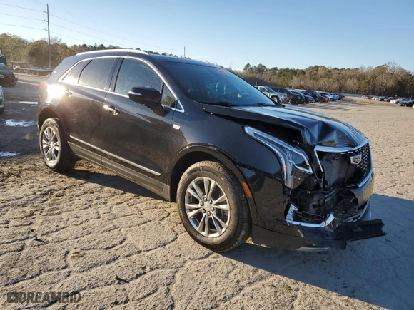 2020 Cadillac XT5 Premium Luxury FWD with VIN 1GYKNCRS0LZ231023, listed as a Copart auction lot 88738685 with 28,245 mi miles and Salvage Title. Bid and sale history available at carsss.com. Image 4.