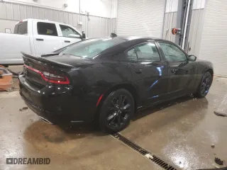 2022 Dodge Charger SXT with VIN 2C3CDXJGXNH203619, listed as a Copart auction lot 84207854 with 60,002 mi miles and Salvage Title. Bid and sale history available at carsss.com. Image 3.