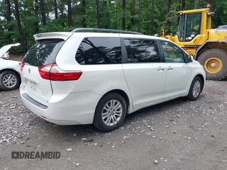 2016 Toyota Sienna XLE with VIN 5TDYK3DC9GS756582, listed as a IAAI auction lot 42506733 with 155,678 mi miles and . Bid and sale history available at DreamBid. Image 4.