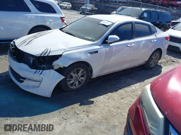 2016 Kia Optima LX with VIN KNAGT4L39G5073865, listed as a IAAI auction lot 41675211 with 120,751 mi miles. Bid and sale history available at carsss.com. Image 18.