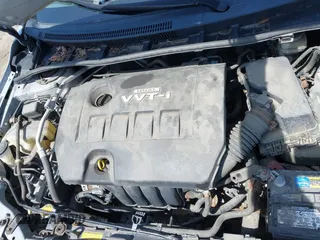 2010 Toyota Corolla with VIN 2T1BU4EEXAC298637, listed as a IAAI auction lot 42036415 with 103,885 mi miles. Bid and sale history available at carsss.com. Image 6.