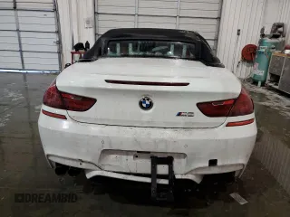 2016 BMW M6 z VIN WBS6G9C58GD932069, wystawiony jako Copart lot #55722063 z przebiegiem 61 793 mil mil oraz . Historia ofert i sprzedaży dostępna na DreamBid. Obrazek 6.