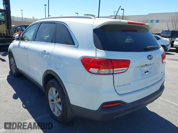 2018 Kia Sorento LX with VIN 5XYPG4A52JG354741, listed as a IAAI auction lot 41626561 with 91,242 mi miles and . Bid and sale history available at DreamBid. Image 3.