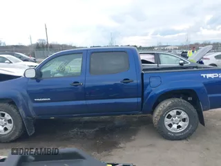 2014 Toyota Tacoma with VIN 3TMLU4EN0EM147243, listed as a IAAI auction lot 41684902 with 308,167 mi miles. Bid and sale history available at carsss.com. Image 13.