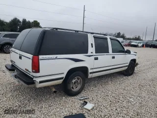 1996 GMC Suburban with VIN 1GDEC16R1TJ741423, listed as a Copart auction lot 83225074 with 488,815 mi miles and Salvage Title. Bid and sale history available at carsss.com. Image 3.
