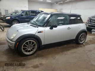 2003 MINI Hardtop z VIN WMWRC33443TJ51003, wystawiony jako Copart lot #52404155 z przebiegiem 154 684 mil mil oraz Czysty tytuł • Clean title. Historia ofert i sprzedaży dostępna na DreamBid. Obrazek 1.