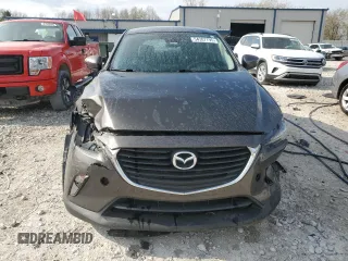 2018 Mazda CX-3 Touring z VIN JM1DKDC79J0311181, wystawiony jako Copart lot #54307795 z przebiegiem 141 348 mil mil oraz Czysty tytuł • Clean title. Historia ofert i sprzedaży dostępna na DreamBid. Obrazek 5.