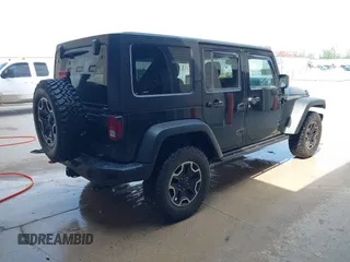2015 Jeep Wrangler Unlimited Rubicon Hard Rock с VIN 1C4HJWFG0FL550247, выставлен на аукционе IAAI как лот 42474614 с пробегом 93 084 миль миль и . История ставок и продаж доступна на DreamBid. Изображение 4.