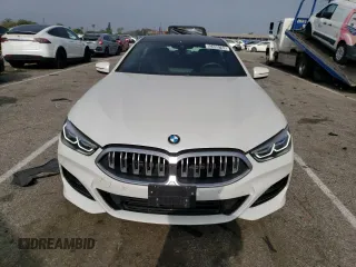 2023 BMW 8 Series 840i with VIN WBAGV4C04PCK51113, listed as a Copart auction lot 52495763 with 17,688 mi miles. Bid and sale history available at carsss.com. Image 5.