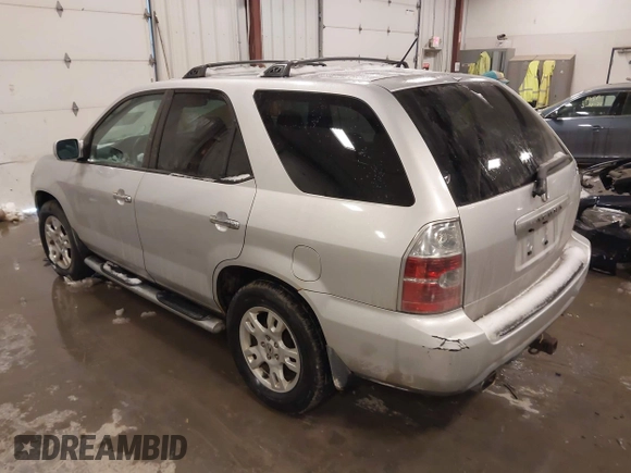 2004 Acura MDX Touring Pkg w/Navigation with VIN 2HNYD18874H506394, listed as a IAAI auction lot 41589065 with 211,253 mi miles. Bid and sale history available at carsss.com. Image 3.