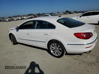 2010 Volkswagen CC with VIN WVWMP9AN1AE559959, listed as a Copart auction lot 76203974 with 188,396 mi miles and Salvage Title. Bid and sale history available at DreamBid. Image 2.