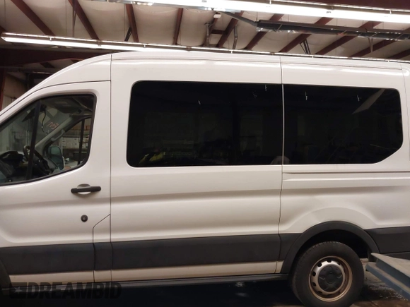 2019 Ford Transit Passenger XL z VIN 1FMZK1CM8KKA27343, wystawiony jako IAAI lot #41607428 z przebiegiem 110 797 mil mil oraz . Historia ofert i sprzedaży dostępna na DreamBid. Obrazek 14.