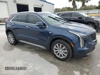 2021 Cadillac XT4 FWD Premium Luxury z VIN 1GYFZCR48MF056210, wystawiony jako Copart lot #45818245 z przebiegiem Nie podano mil oraz Nie do naprawy • Non repairable. Historia ofert i sprzedaży dostępna na DreamBid. Obrazek 4.