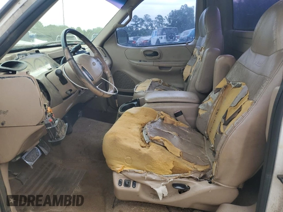 1999 Ford F-150 XL with VIN 1FTRF17L8XNA75702, listed as a Copart auction lot 69868104 with Not provided miles and Salvage title. Bid and sale history available at DreamBid. Image 7.
