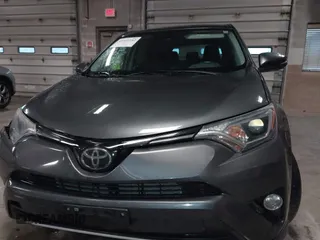 2018 Toyota RAV4 XLE with VIN 2T3RFREVXJW788412, listed as a IAAI auction lot 41931142 with 119,962 mi miles. Bid and sale history available at carsss.com. Image 12.