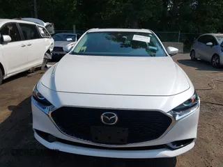 2022 Mazda 3 Carbon Edition with VIN 3MZBPACL0NM318573, listed as a IAAI auction lot 42403393 with 8,762 mi miles and . Bid and sale history available at DreamBid. Image 13.