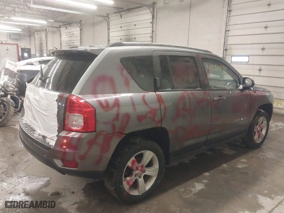 2012 Jeep Compass Latitude with VIN 1C4NJDEB8CD655864, listed as a IAAI auction lot 41250034 with 121,509 mi miles. Bid and sale history available at carsss.com. Image 4.