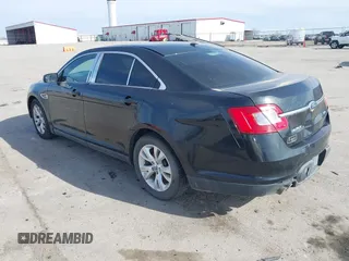 2011 Ford Taurus SEL with VIN 1FAHP2EW7BG139615, listed as a IAAI auction lot 41954932 with 256,223 mi miles. Bid and sale history available at carsss.com. Image 3.
