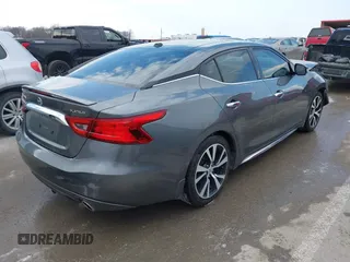 2016 Nissan Maxima SV with VIN 1N4AA6AP7GC904538, listed as a IAAI auction lot 41689785 with 80,182 mi miles and . Bid and sale history available at DreamBid. Image 4.