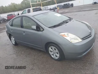 2005 Toyota Prius z VIN JTDKB20U153035380, wystawiony jako IAAI lot #42311441 z przebiegiem 141 120 mil mil oraz . Historia ofert i sprzedaży dostępna na DreamBid. Obrazek 1.