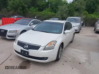 2009 Nissan Altima S with VIN 1N4AL21EX9N557960, listed as a IAAI auction lot 42061700 with 222,783 mi miles and . Bid and sale history available at DreamBid. Image 2.